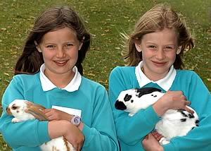 Young visitors learning how to be responsible pet owners