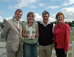 Chris and Caroline Hoddgkins receive their award from left, Caltech’s David Johnson and HDSBA chair, Jennifer Atkinson