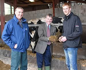 Harry, left, and David Hodgson assess the TMR with  Carrs Billington nutritionist Gareth Brolly, centre.