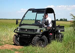 New olive John Deere XUV Gator