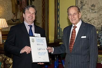 Marcus Hollingshead being presented with the award by HRH Prince Philip