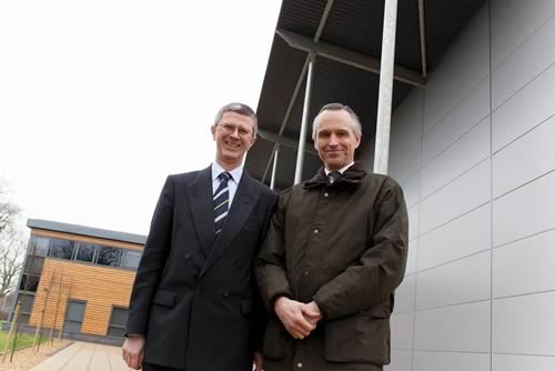 Harper Adams Vice Chancellor and Lord de Mauley outside the new Agricultural Engineering Innovation Centre